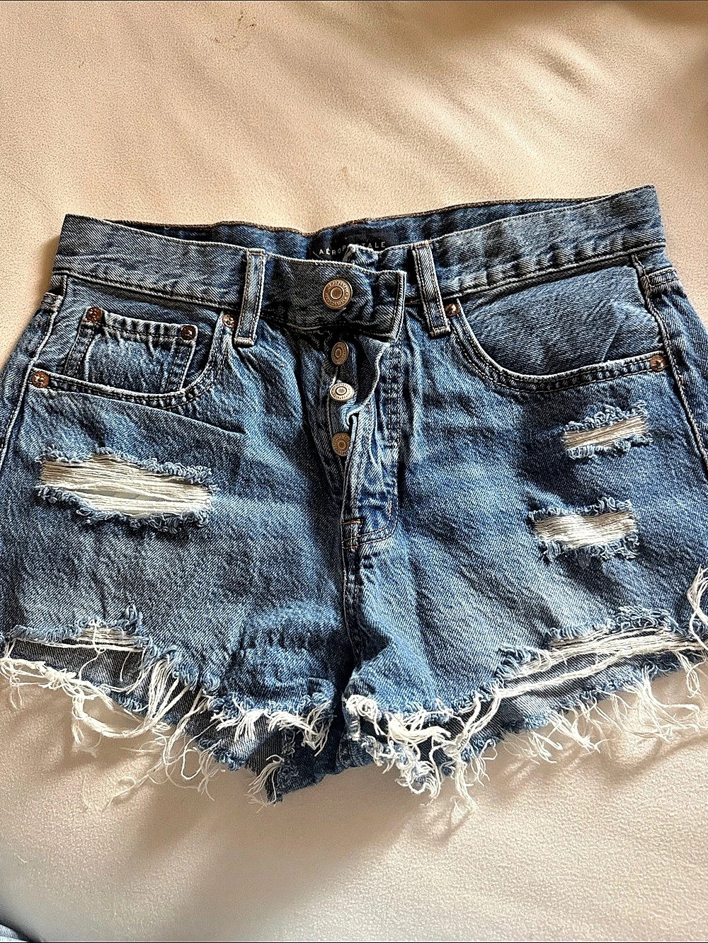 Distressed Denim Jean Shorts in Blue